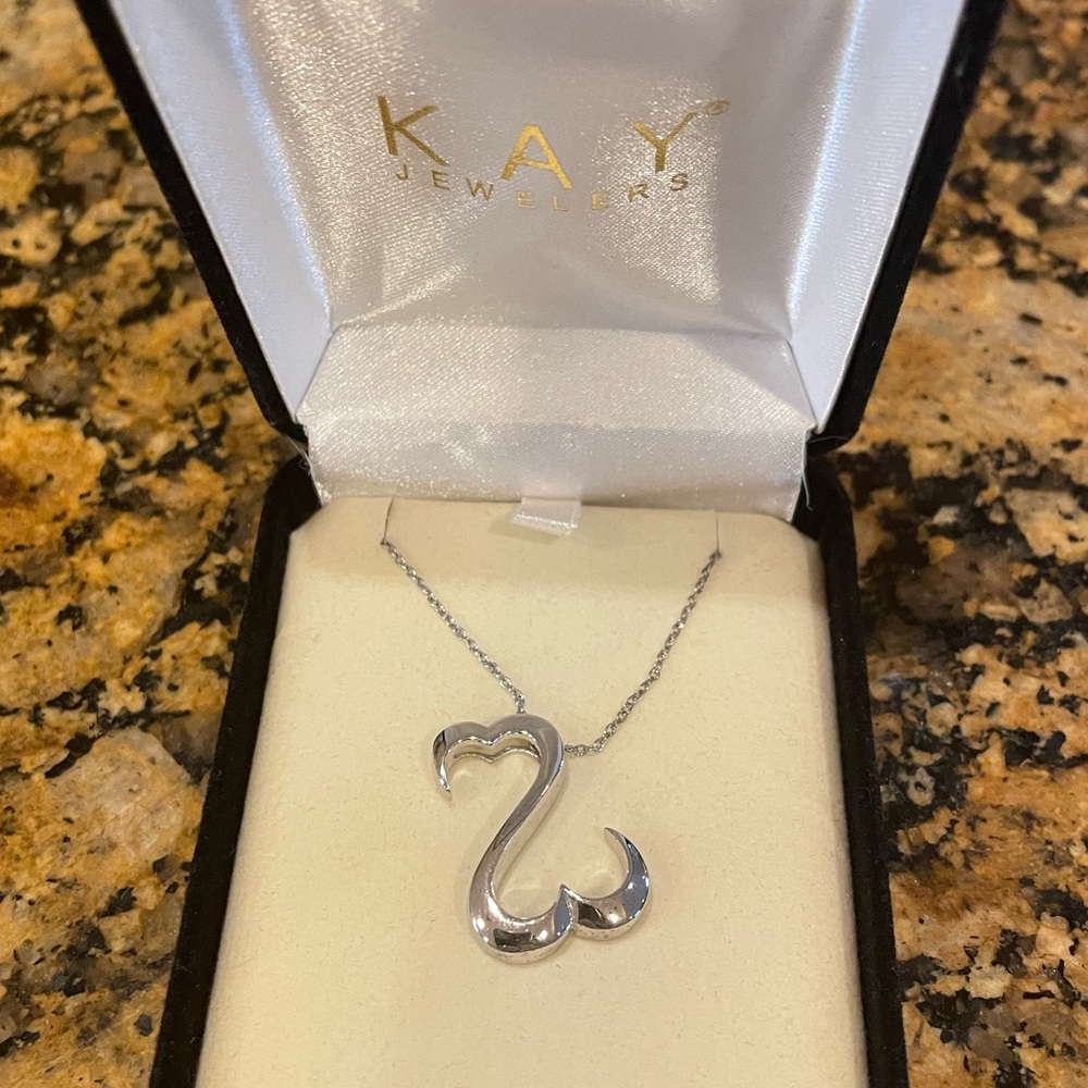 Jane Seymour Open Hearts necklace and pendant Sterling silver never worn in box.